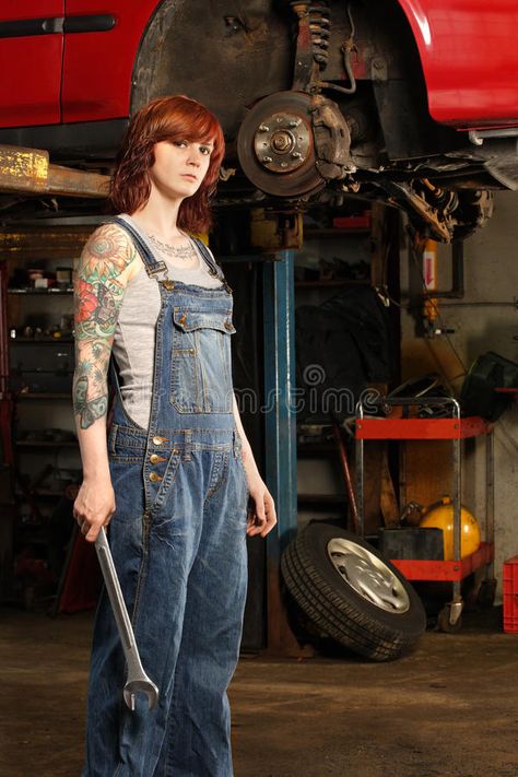 Female mechanic with tattoos. Photo of a young beautiful redhead mechanic wearin , #Affiliate, #beautiful, #young, #wearing, #redhead, #mechanic #ad Mechanics Photography, Female Mechanic, Redhead Facts, Mechanic Clothes, Steampunk Mechanic, Wearing Overalls, Woman Mechanic, Girl Mechanics, Motorcycle Wear