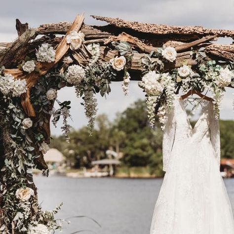 Knotted Roots On The Lake on Instagram: "Just look at this dress hanging from the arch over our beautiful lakefront😍😍 • • #KnottedRootsonTheLake #WeddingVenue #LandOLakes #TampaBay #Florida #Weddings #LakeFrontWedding #OutdoorVenue #Wedding #Bride #WeddingDay #WeddingInsta #WeddingDecor #ThemeWedding #WeddingInspiration #WeddingInspo #WeddingDesign #WeddingStyle #Wedding #WeddingPlanning #KnotTheLastDance #Happiness #Love #IDo #WeddingDress Photo Credit: Allison Leigh" The Arch, Outdoor Venues, Wedding Designs, Wedding Bride, Photo Credit, Wedding Inspo, Wedding Styles, Our Wedding, Wedding Venues