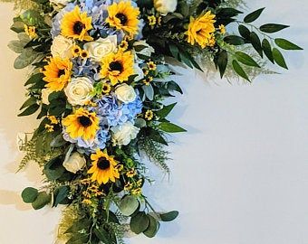 Wedding arch with sunflowers | Etsy Sunflower Floral Arrangements Wedding, Corner Arbor, Ruscus Greenery, Blue Sunflower Wedding, Barn Wedding Flowers, Sunflower Wedding Decorations, Arbor Decor, Country Wedding Flowers, Wedding Flowers Sunflowers