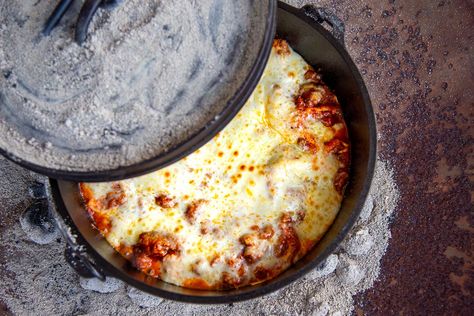 Outdoor cooking doesn't have to mean eating instant potatoes or rice and beans. This Dutch oven lasagna recipe ensures a delicious backcountry dinner. Cast Iron Lasagna Recipe, Lasagna In Dutch Oven, Camping Lasagna, Soup In Dutch Oven, Dutch Oven Lasagna Recipe, Dutch Oven Breakfast, Dutch Oven Lasagna, Dutch Oven Beef, Oven Beef Stew