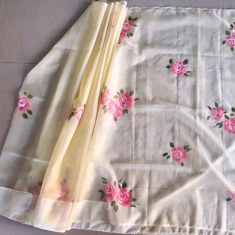 Rose🌹 Pink roses delicately hand-painted on a pastel yellow organza saree. Comes with an unstitched blouse piece. Shop now! @inaayatbyaastha Colour Customisation available! DM us now to get one customised in your choice of colours! . . . . . . . . . #handmade #inaayatbyaastha #handpaintedsaree #artwork #luxurywear #organzasaree #organza #handpaintedorganzasaree #rose #rosesaree #sixyardsofelegance #sareenotsorry #bridalsaree #bridesmaids #haldisaree #festivesaree #sareeblouseinspiratio... Hand Paint Sarees, Rose Fabric Painting, Hand Paint Saree, Yellow Organza Saree, Hand Paintings, Hand Painted Sarees, Yellow Saree, Luxury Wear, Organza Saree