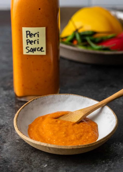 Peri peri sauce is an African sauce made from piri-piri chilis that is salty, spicy, and a bit sweet. You can add it to almost anything! Peri Peri Sauce Recipe, Piri Piri Sauce, Sweet Chili Sauce Recipe, Bulgogi Sauce, Peri Peri Sauce, Chili Sauce Recipe, Hot Sauce Recipes, Piri Piri, Avocado Sauce