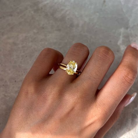 The Chelsea with custom knife edge band💍 💎Details -Fancy yellow -Oval cut -VS1 -2.5ct -18k yellow gold #engagementring #ovalengagementring #proposal Coloured Engagement Rings Vintage, Yellow Diamond Ring Engagement, Coloured Engagement Rings, Colored Wedding Rings, Jewelry Goals, Fancy Color Diamond Ring, Book Edits, Engagement Ring Yellow, Canary Diamond