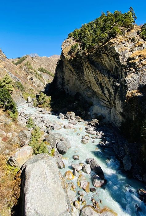 As we go through the warm welcoming of the nature and the people, the view of three highest peaks; Lhotse(8,516 m), Makalu (8,481 m) and Cho Oyu (8,201 m) mesmerizes our eyes and hearts. The soothing sound of the swift flowing rivers like Bhote Koshi and Dudh Koshi keeps us going along with various bridges covered with prayer flags. We trek through the traditional villages such as Namche Bazaar, Tengboche and Dzongla. The most adventurous yet the most remarkable spot 5,545 m high Kala Patthar... Namche Bazaar, Cho Oyu, Altitude Sickness, Everest Base Camp Trek, Everest Base Camp, Prayer Flags, Route Map, Base Camp, Camping Trips