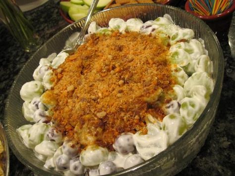 Grape Salad With a Twist. Had this at a party last night. But the butter finger wasn't as chopped up (Which was really yummy) It looked really weird and no one wanted to taste it. BUT it was seriously SOOOO amazing. Going to make this for sure!! So happy I found it!!!!!!! Grape Salad With Cream Cheese Butterfinger, Butterfinger Grape Salad, Grape Salad With Butterfinger, Butterfinger Salad, Grape Butter, Grape Dessert, Grape Salad Recipe, Butterfinger Candy, Twisted Recipes