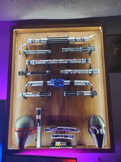 Lightsaber display case Lightsaber Display, Jedi Temple Guard, Star Wars Room Decor, Temple Guard, Jedi Temple, Disney Room, Lightsaber Hilt, Star Wars Room, Disney Rooms