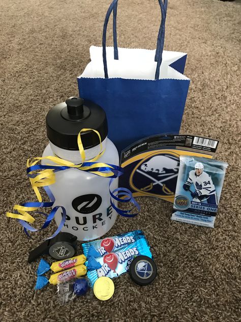 Hockey Party favor bags Hockey Birthday Favors, Road Hockey Birthday Party, Nhl Theme Birthday Party, Hockey Tournament Bags, Hockey Goodie Bags, Hockey Loot Bag Ideas, Ice Hockey Birthday Party, Nhl Birthday Party Ideas, Kids Hockey Birthday Party