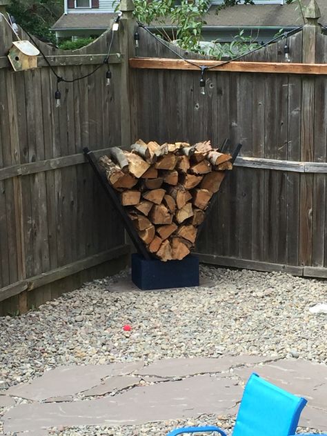 $6 firewood storage! Cinder block project. Diy Fire Pit Wood Storage, Backyard Firewood Storage Ideas, Cinder Block Wood Storage, Cinder Block Wood Holder, Easy Firewood Storage, Fire Pit Wood Storage Backyard, Outdoor Fire Storage, Campfire Wood Storage Diy, Cinder Block Firewood Holder