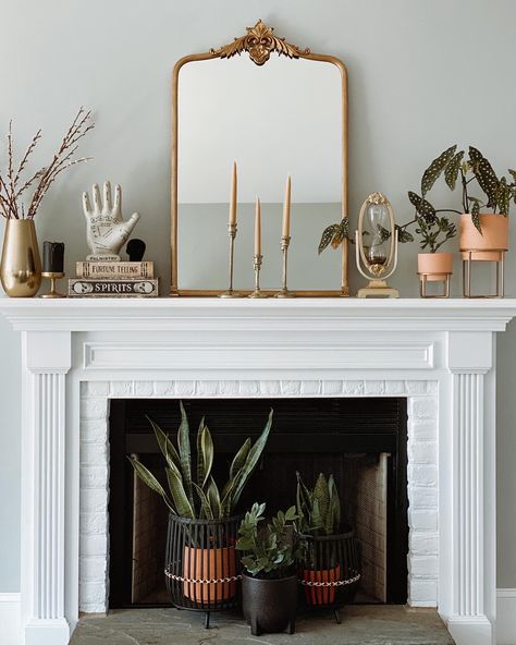 Halloween Fall Mantle Ideas, Tiny Home Halloween Decor, Boarded Fireplace Ideas, Mantle Decor Maximalist, Witchy Mantel Decor, Modern Halloween Mantle Decor, Minimal Fall Mantle Decor, Mantle Decor Halloween, Witch Mantle Decor