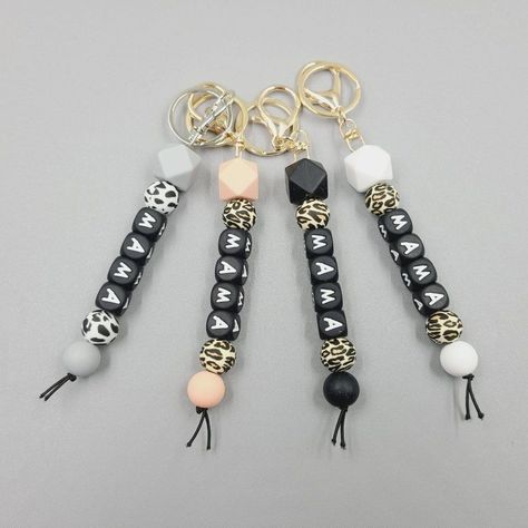 Description Of Mama Beaded Keychain Material: Beads Color: Animal Print | Gold Chain | Black | Leopard Print Comes In Different Colors: Pink | White | Pink | Grey | Gray Type: Diaper Bag Pendant | Keychain Perfect For Gift Giving Rose Bag, Beaded Keychain, Key Wallet, Card Case Wallet, Black Leopard Print, Tassel Keychain, The Black Keys, Heart Keychain, Handbag Charms