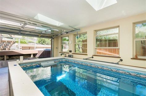 Are you getting the most out of your garage? This Endless Pool lets you swim in place (think of it as a swimmer's treadmill) in your own garage gym! Garage Pool House, Indoor Garage, Endless Pools, Indoor Pool House, Hot Tub Room, Pool Images, Endless Pool, Spa Rooms, Basement Pool