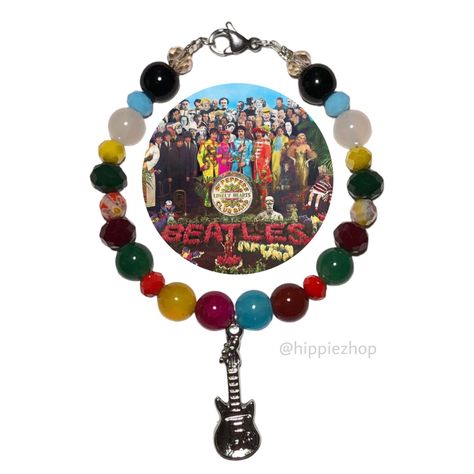 the beatles 
abbey road
handmade beaded bracelet 
hippiezhop
splhcb The Beatles Bracelet, Music Inspired Jewelry, Pulseras Ideas, Bracelet Keychains, Bracelets Ideas, Beads Ideas, Making Jewellery, Lonely Heart, Homemade Jewelry