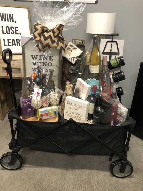 Diy Auction Basket Ideas, Big Raffle Basket Ideas, Auction Theme Baskets, Home Decor Basket Ideas, Large Raffle Basket Ideas, Wagon Gift Basket Ideas, Classroom Auction Basket Ideas, Wine Auction Basket Ideas, Extravagant Gift Baskets