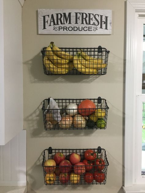 Kitchen produce wall baskets Kitchen Wall Baskets Decor, Wall Baskets Kitchen, Produce Baskets On Wall, Kitchen Wall Baskets, Wall Vegetable Storage, Wall Baskets For Fruit, Wall Fruit Basket Ideas, Vegetable Baskets For Kitchen, Kitchen Produce Storage Wall