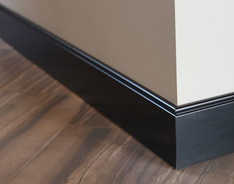 Interior Products | base moulding softens floor-to-wall transitions with the perfect finishing touch | Bayer Built Woodworks, Inc. Dark Baseboards And Trim, Black Moldings And Trim, Dark Baseboards, Black Baseboards, Baseboards And Trim, Black Trim Interior, Baseboard Ideas, Modern Baseboards, White Baseboards