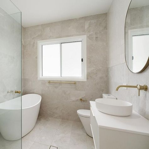 RockSalt White Gold plus white cabinetry and gold hardware is the ultimate combo 👌 ✨ @allfitzhomes_ have recently complete this home with these two bathrooms decked out in floor to ceiling RockSalt 😍 Floor To Ceiling Bathroom Tile, Gold Hardware Bathroom, Gold Tile, Beaumont Tiles, Bathroom Ceiling, White Cabinetry, Floor To Ceiling, Main Bathroom, Dream Home Design