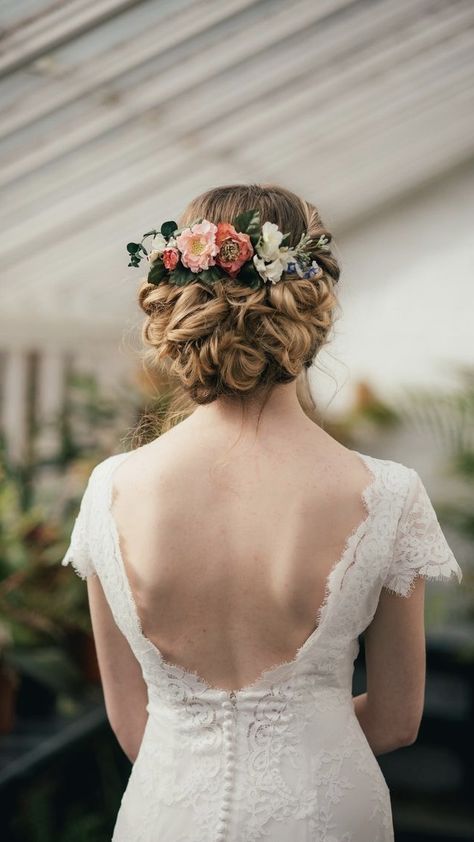 Wedding Updo With Flowers And Veil, Wedding Hair Updo Flowers, Boho Bridal Updo With Flowers, Floral Bride Hair, Floral Updo Wedding, Flower Comb Hairstyle, Bridal Hair With Flower Comb, Bride Flower Hairstyles, Wild Flower Hair Wedding