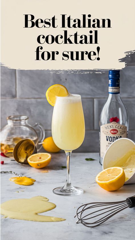 This image highlights a creamy, lemon-infused Italian cocktail served in a champagne flute, garnished with a lemon slice. The text, "Best Italian cocktail for sure!" suggests this is a standout drink, possibly a variation of a Limoncello-based cocktail or another citrus-forward Italian creation, ideal for any occasion. Italian Alcoholic Beverages, Italian After Dinner Drinks, Italian Inspired Cocktails, Italian Drinks Alcohol Cocktails, Italian Drink Recipes, Italian Drinks Alcohol, Italian Drinks, Fun Drinks Alcohol, Italian Party