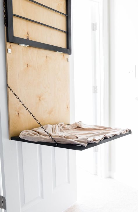 Today I'm sharing the build plans for the pull-down, door-mounted drying rack I made. Bonus: It has a spot for drying sweaters. Diy Folding Clothes, Diy Clothes Drying Rack, Wall Drying Rack, Folding Clothes Drying Rack, Laundry Room Drying Rack, Tiny Laundry, Sweater Drying Rack, Laundry Drying Rack, Laundry Nook