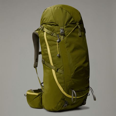 Adjustable 60-litre cinch-top backpack with stuff-it pocket for hiking Roomy fit: This bag offers plenty of room for essentials and everyday belongings. This season's updated Terra Backpack proves once again that carrying heavier loads needn't be back-breaking. This classic trekking backpack, designed for many days on the trail, features a strategically-patterned back panel, shoulder straps and hip belt that are both comfortable and breathable. The large 65L volume eats up gear, but don't worry about having to rummage around at the bottom to find what you need; the two-way u-zip means you can open up the main compartment and quickly find what you're looking for. The cinch top expands to accommodate extra gear and the compression straps help you cinch it all in to create a more streamlined Trekking Backpack, The Cinch, Water Bladder, Hip Belt, Top Backpacks, Hiking Backpack, Men's Backpack, The Trail, Open Up