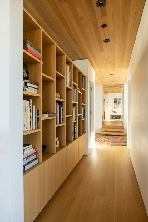 Photo 15 of 16 in This Warm, Inviting Home Captures the Best of Coastal Living on a Tiny L.A. Lot - Dwell Clock In Bathroom, House Near The Beach, Reading Rooms, Beach In California, Contemporary Shelving, Cinder Block Walls, Building A Garage, Studio Build, Hermosa Beach