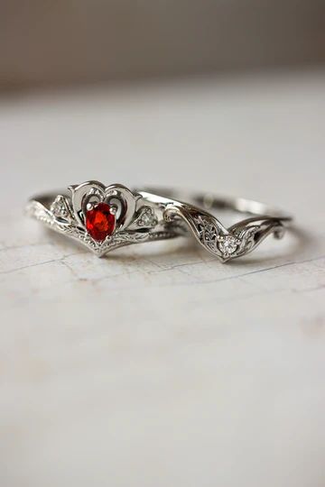 Browse all our unique engagement rings, nature inspired jewelry, wedding bands for couples, floral earrings and delicate pendants. There are leaves engagement rings, statement flower ring, romantic bridal sets and rustic wedding bands. We work wit... Red Rings Engagement, Red Ring Aesthetic, Red Sapphire Engagement Ring, Red Wedding Ring, Red Engagement Ring, Nature Wedding Band, Nice Rings, Fancy Stuff, Nature Engagement Ring