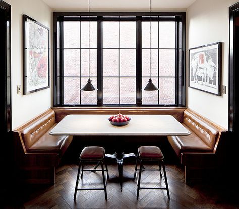 modern industrial eating area with black framed windows mirrored by black frames on doors  art, leather banquettes, herringbone wood floors via YHBHS on Flickr Banquette Seating Restaurant, Restaurant Booth Seating, Kitchen Booths, Leather Banquette, Dining Booth, Restaurant Booth, Kitchen Banquette, Booth Seating, Banquette Seating