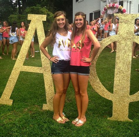 Alpha Phi at East Carolina University #AlphaPhi #APhi #BidDay #letters #sorority #ECU We Struck Gold Bid Day, Struck Gold Bid Day, Future Pirate, Letters Sorority, East Carolina University, Gold Leggings, Short Jean Skirt, Alpha Phi, Bff Pictures