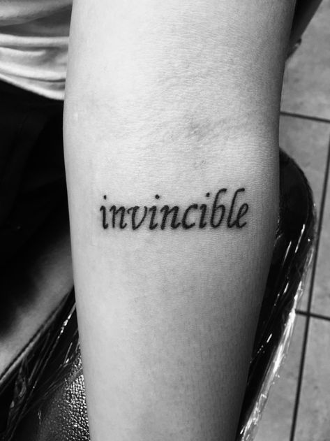 INVINCIBLE - Kelly Clarkson Invincible Tattoo Words, Invincible Tattoo, Small Tattoos For Men, Feather With Birds Tattoo, Tattoo Culture, Cute Tats, Wrist Tattoos For Women, B Tattoo, Small Tattoos For Guys