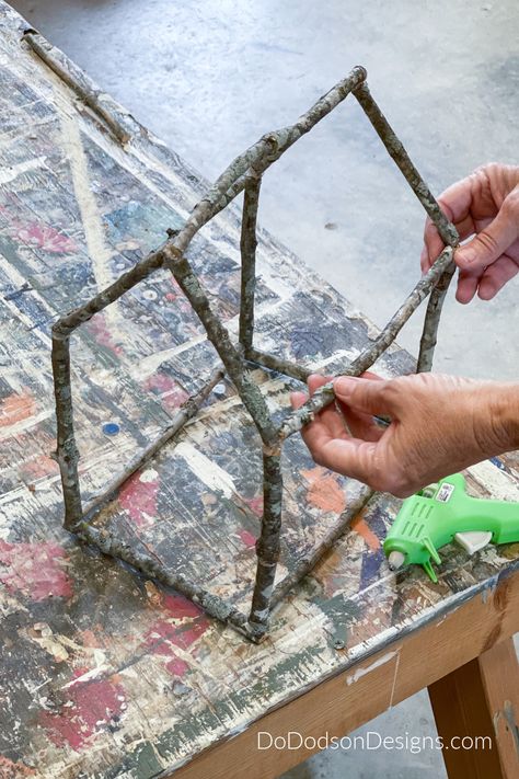 Learn how I made these DIY twig houses and used them as a cute addition to my home decor. All you need is a tree, sticks, and hot glue. I love bringing nature inside my home, and they add to the rustic feel of my farmhouse style. Twig Crafts, Twig Art, Outdoor Crafts, Fairy Garden Diy, Nature Crafts, Outdoor Oasis, Garden Crafts, Disney Halloween, Craft Stick Crafts