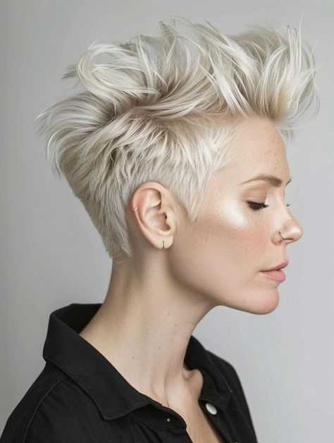 Trending Pixie Haircuts for 2024: Styles and Inspirations Faux Pixie Haircut, Platinum Pixie Haircut, Faux Hawk Pixie, Unique Short Hair, Platinum Blonde Pixie Cut, Punk Pixie Cut, Modern Pixie Haircut, Ash Blonde Pixie, Short Pixie Hair