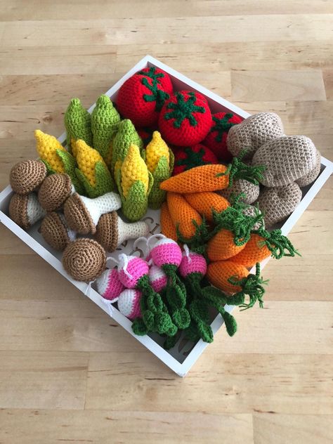 Handmade crochet vegetables perfect for tiered tray decor , party decor , kitchen decor and kitchen play set for your kids. All vegetables approximately 2,5-3 inches They are ready to dispatch from Florida If you choose to purchase a set you will have one tomato , one potato, one radish, one carrot, one mushroom and a corn For our other crochet accessories, please visit www.etsy.com/shop/CuteAlley?ref=shop_sugg For our other crochet blankets, please visit www.etsy.com/shop/CuteAlley?ref=shop_sug Crochet Vegetable Garden, Crochet For Gardeners, Vegetable Crochet Pattern, Crochet Food Set, Crochet Play Kitchen, Crochet Kitchen Accessories, Crochet Toy Set, Kids Crochet Toys, Crochet Toy Food