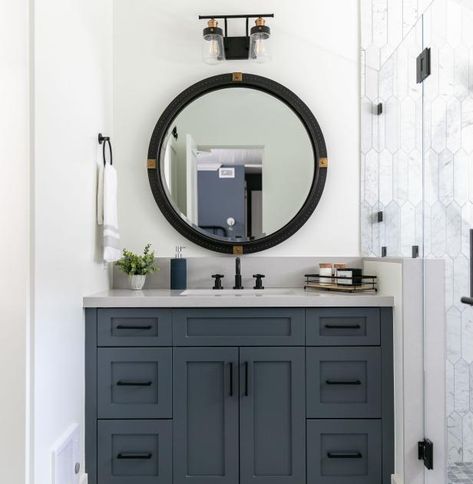 Waterside Retreats | 2023 | HGTV Gray Black Bathroom, Contemporary Coastal Bathroom, Dark Gray Vanity, Bathroom Rich, White Coastal Bedroom, Coastal Family Rooms, Doorless Shower, Blue Bathroom Vanity, Record Room