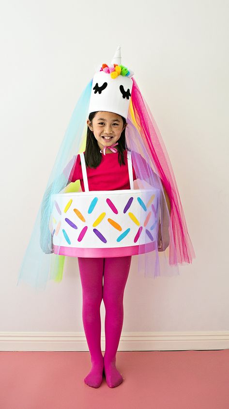 DIY Unicorn Cake Costume. What a cute and sweet Halloween costume idea for kids. Diy Cake Costume, Cake Costume For Kids, Diy Unicorn Cake, Unicorn Costume Kids, Cake Costume, Rainbow Costumes, Halloween Crafts For Toddlers, Diy Halloween Costumes For Kids, Book Day Costumes