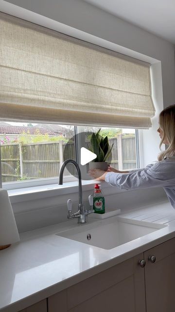 SelectBlinds Official USA on Instagram: "🌟 Effortless room refresh! 🌟

Watch as @our_4bed effortlessly transforms her space with our Classic Roman Shades in the timeless color White Linen. ✨ In less than 5 minutes, she creates a chic and cozy atmosphere that elevates her kitchen decor! Just place the headrail in the window, attach the shade, and voilà—instant style! 🏡✨" Roman Shade Kitchen Window, Kitchen Blinds Ideas Above Sink, Kitchen Roman Shades, Roman Shades Kitchen, Classic Roman Shades, Select Blinds, Room Refresh, House Window, Window Room