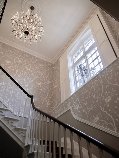 Narrow Stairway Wallpaper, Wallpaper With White Walls, Wallpaper Above Dado Rail Hallway, Entrance Way Wallpaper, Dado Rail Hallway Wallpapers, Panelled Hallway With Wallpaper, Panel Wallpaper On Stairs, Stairway Wallpaper Ideas, Wallpaper In Stairway