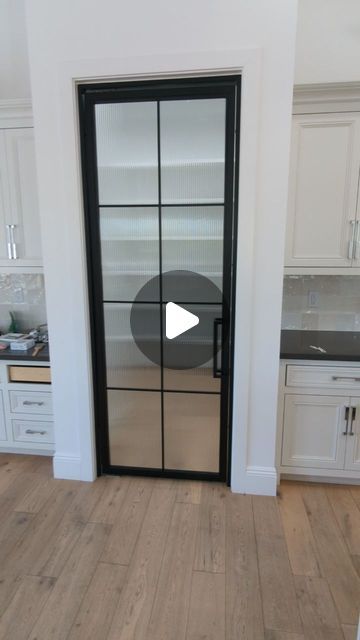 Steel & Stone on Instagram: "Pivot self closing pantry doors are a must have ! Love the functionality on top of the show stopping look they add to the kitchen !" Contemporary Pantry Door, Kitchen Pantry Sliding Door, Black Kitchen Pantry Doors, Cool Pantry Doors, Pantry Door In Kitchen, Pantry Doors Ideas Kitchen, Black Pantry Door, Modern Pantry Door, Kitchen Pantry Door