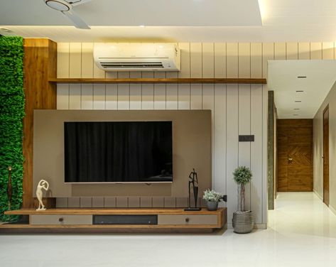 Residential Interior | Charcoal Hues Design Studio | Surat - Interiorlover Main Hall Tv Unit Design, Tv Cabinate, Tv Unite, Tv Panels, Lcd Unit, Lcd Wall, Lcd Units, Hall Cupboard, Tv Cupboard