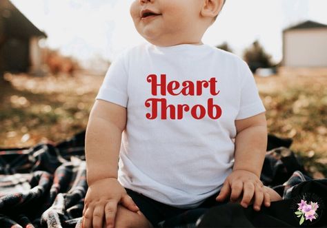 Excited to share this item from my #etsy shop: Heart Throb Valentine's Day Onesie, My First Valentine's Day Baby Bodysuit, Minimalist Toddler Shirt, Boho Retro Neutral #valentinesday #bohohippie #minimalistclothing #custombabygift #babyshowergift #personalizedonesie Boys Valentines Outfit, Baby Valentines, Valentines Shirts, Outfit Baby Boy, Cricut Shirts, Heart Throb, Valentines Day Baby, Toddler Valentines, Custom Baby Gifts