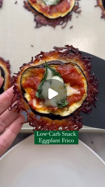 Ereka Vetrini on Instagram: "Bored of your snack choices? Try my EGGPLANT FRICO! It’s the perfect low-carb snack!!  Ingredients: 1 eggplant sliced into 1/2 inch thick circles 1/2 tbsp of salt (approximately) 1 tbsp olive oil 1 rounded tbsp of grated Parmigiano Reggiano per eggplant slice 1 rounded tbsp sauce per slice 1 tbsp shredded mozzarella per eggplant slice 1 piece of basil per eggplant slice  Roasting the Eggplant: -Preheat oven to 400F. -Generously salt the sliced eggplant and let sit for 15-30 minutes. -Using a paper towel, wipe the “sweat” and most of the salt from the eggplant and place on a parchment lined baking sheet. -Brush with olive oil and roast for 30 minutes.  Making the Frico: -Preheat oven to 400F. -Line a separate baking sheet with a silicon mat or parchment paper. Eggplant Frico, Sliced Eggplant, Mediterranean Diet Meals, Eggplant Sauce, Mediterranean Meal Plan, Roasted Eggplant, Vegan Nutrition, Free Keto Recipes, Diet Meals