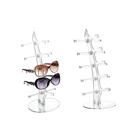 PRICES MAY VARY. Glasses holder stand size :11.6inch X12.6inch X11.4inch. Easy to install and save space. Nice Material: Sunglasses rack holder made of acrylic material, lightweight and durable,Transparent Color. What Do You Get: Each glasses display stand can hold 5 pairs glasses.you will get 2 pcs glasses Holder. Application:Great to organize all your glasses, sunglasses, optical glasses, ski goggles etc.It is also very suitable for glasses stores to display all kinds of eyeglasses。 If you hav Sunglasses Rack, Eyeglasses Display, Glasses Display, Eyewear Display, Sunglasses Organizer, Sunglasses Display, Acrylic Display Stands, Glasses Holder, Acrylic Jewelry