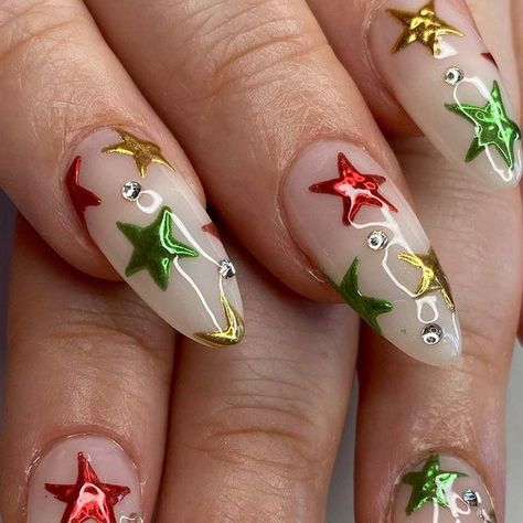 Star Design Nails Ideas To Copy In 2024 ★ Christmas Nails Edgy, Star Christmas Nails, Funky Christmas Nails Design, Christmas Aura Nails, Christmas Nails Y2k, Christmas Y2k Nails, Alt Christmas Nails, Chrome Stars Nails, Vintage Christmas Nails