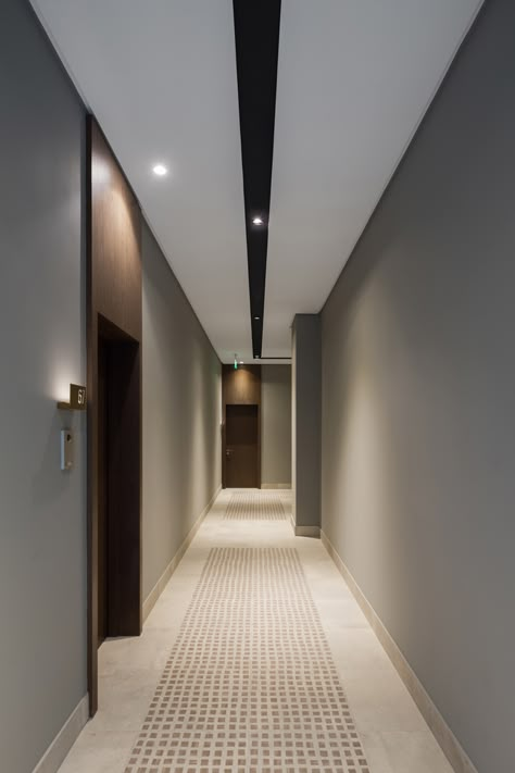 Multifamily Corridor Design, Lobby Floor Design, Apartment Corridor Design, Corridor Flooring, Apartment Building Hallway, Hotel Corridor Design, Apartment Corridor, Studio Building, Building Extension