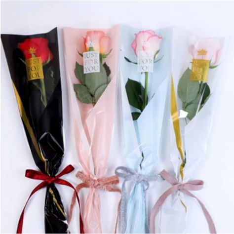 PRICES MAY VARY. FLOWER BAG: Adorable single flower wrap, waterproof, colorblock design make your flowers pop in any occasion, simple and elegant decoration for roses, wrap single stem roses perfectly. PRODUCT SIZE: Perfect packaging plastic bags for 1-2 pcs flowers，top size: 5inches; Bottom: 1.6 inch; Height: 17.7 inch. Material: Clear and waterproof plastic material, elaborately made,Vintage triangle design, makes your flowers looked more attractive Colors: White, Black, blue，pink，4colors,25PC Wrap Flowers, Bouquet Bag, Pipe Cleaner Flowers, Woolen Flower, Crafter Gift, Handmade Bouquets, Flower Wrapping, Floral Wrapping Paper, Paper Flower Decor