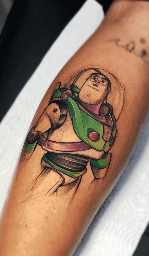 Buzz Lightyear Tattoo Design Images (Buzz Lightyear Ink Design Ideas) Buzz Light Year Tattoo, Tatuagem Toy Story, Buzz And Woody Tattoo, Buzz Lightyear Tattoo, Buzz Tattoo, Colourful Tattoo, Toy Story Tattoo, Michael Tattoo, Birthday Tattoo