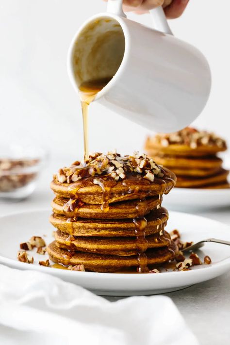 Paleo Pumpkin Pancakes with Maple Ginger Syrup Paleo Pumpkin Pancakes, Carrot Cake Pancakes, Pumpkin Pancake Recipe, Healthy Pancake Recipes, Sweet Potato Pancakes, Whole Roasted Cauliflower, Stuffed Sweet Potato Healthy, Ginger Syrup, Paleo Pumpkin