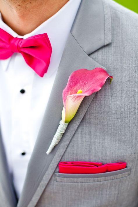 Gray Suit with Pink Bow Tie, Pocket Square, and Calla Lily Boutonniere Grey Tux Pink Tie, Pink Bow Tie Outfit Men, Grey Tux Wedding, Bow Tie Outfits Men, Pink Prom Suit, All Black Tux, Grey Tux, Calla Lily Boutonniere, Tight Prom Dresses