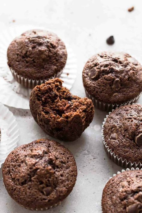 Chocolate zucchini muffin with a bite taken out of it Double Chocolate Zucchini Muffins, Chocolate Zucchini Muffins, Chocolate Zucchini Cake, Amazing Chocolate Cake Recipe, Pane Dolce, Zucchini Cake, Zucchini Muffins, Best Chocolate Cake, Chocolate Zucchini