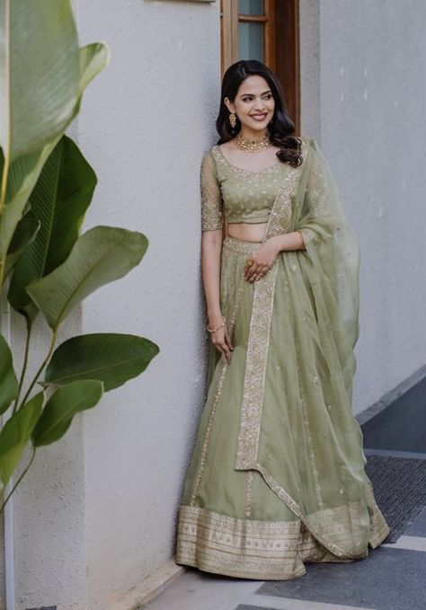 WhatsApp on 9496803123 to customise your handcrafted designer bridal wear with us online. Book your appointment today. We do ship internationally. (Pics for reference) Pastel Green Lehenga Bridal, Green Lehenga Outfit, Saree Gowns Dresses Indian, Green Lehenga Bridal, Lehenga With Shrug, Light Green Lehenga, Mehandi Outfit, Bridesmaid Lehengas, Saree Function