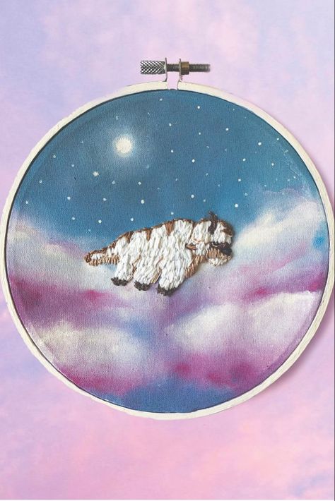 A watercolor embroidery of the creature Appa from Nickelodeon’s Avatar the Last Airbender. He is flying through a pastel sky of clouds, stars, and a moon full of shades of light pink, blue, and purple. Appa Embroidery, Avatar Embroidery, Princess Yue, Watercolor Sky, Painted Jeans, Avatar The Last Airbender Art, Diy Watercolor, Star Sky, Avatar The Last Airbender